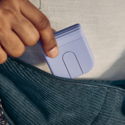 Logitech Mobi Fold mouse Lilac folded and slipping into a pocket
